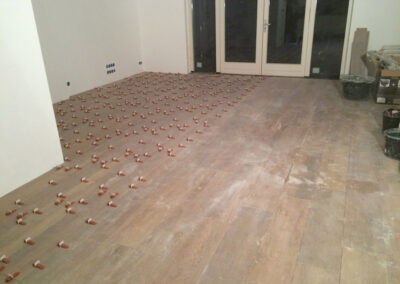 Tegelvloer geplaatst in Amsterdam door Ter Haar Techniek